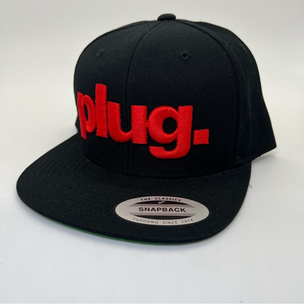 Plug Black with Red Lettering SnapBack Yupoong Hat New